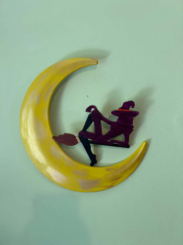 half moon with witch