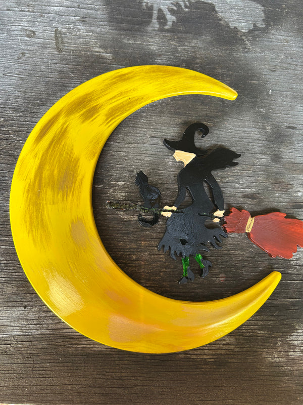 half moon with witch