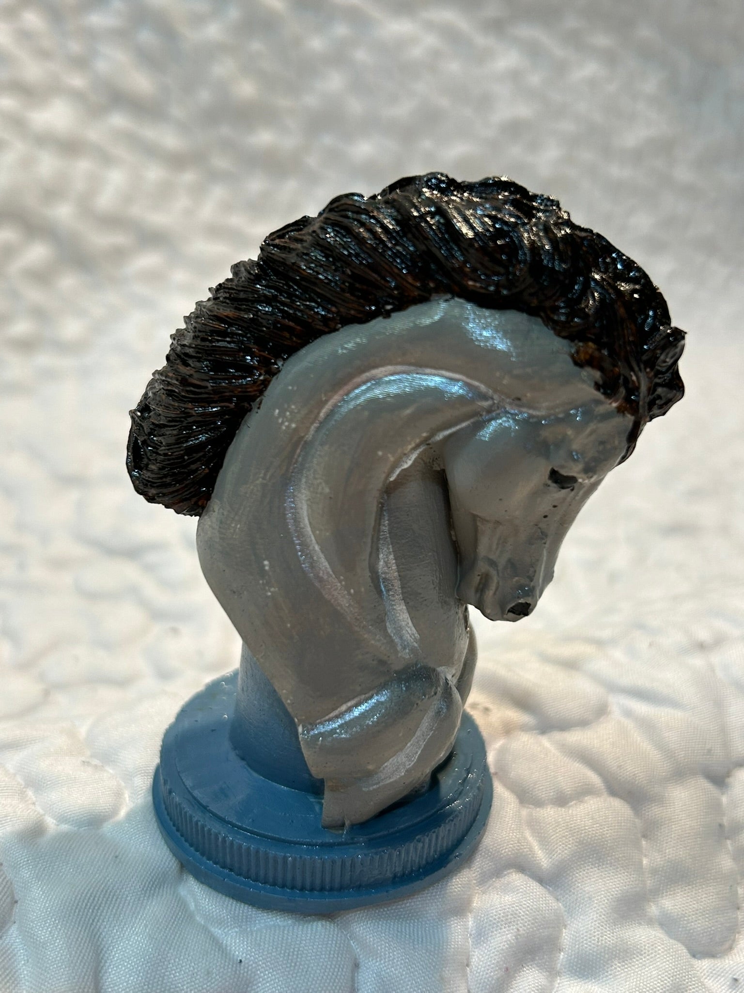 Horse head figurine
