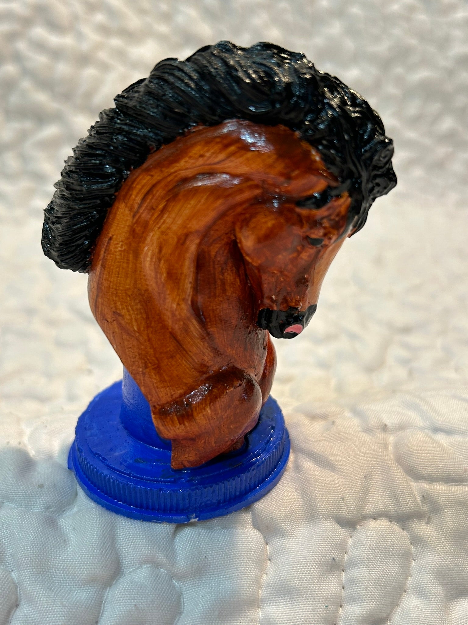 Horse head figurine