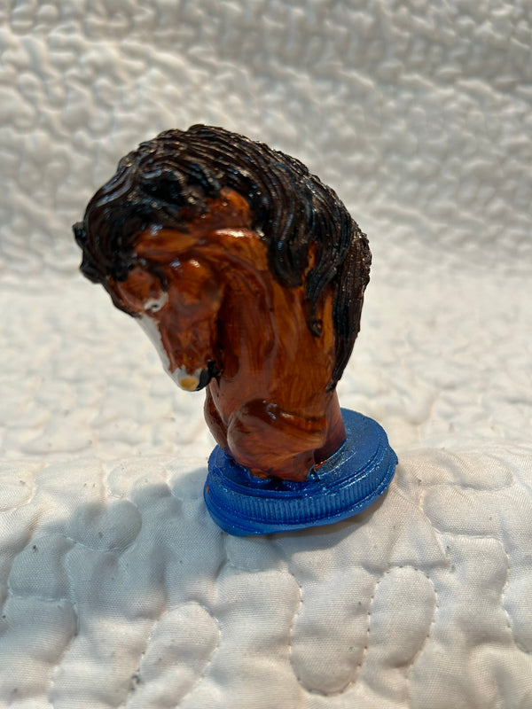 Horse head figurine