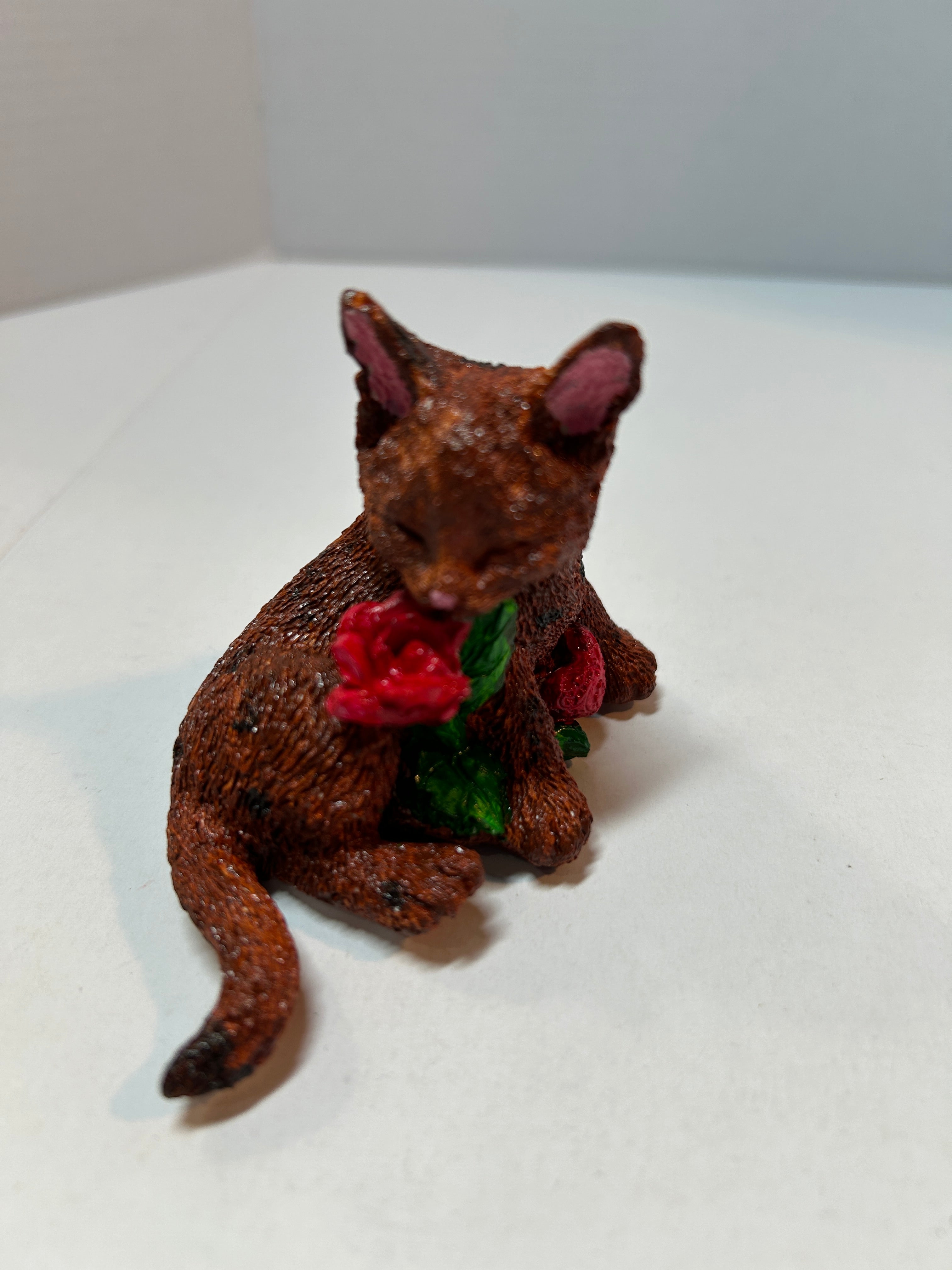 Small cat with Rose