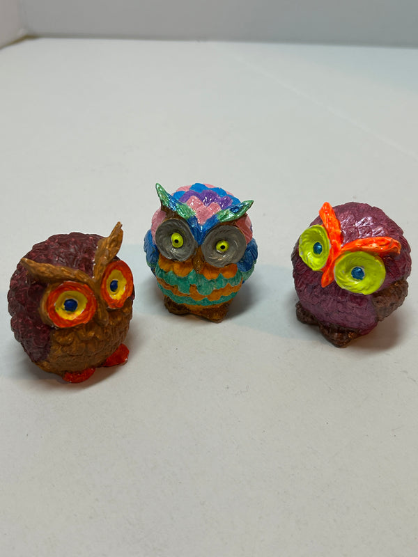small colorful owls