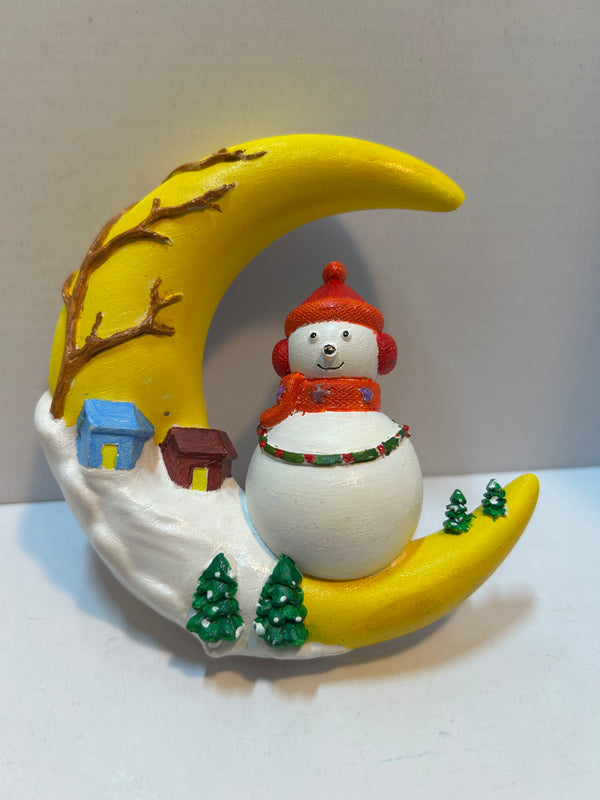 snowman on 1/2 moon