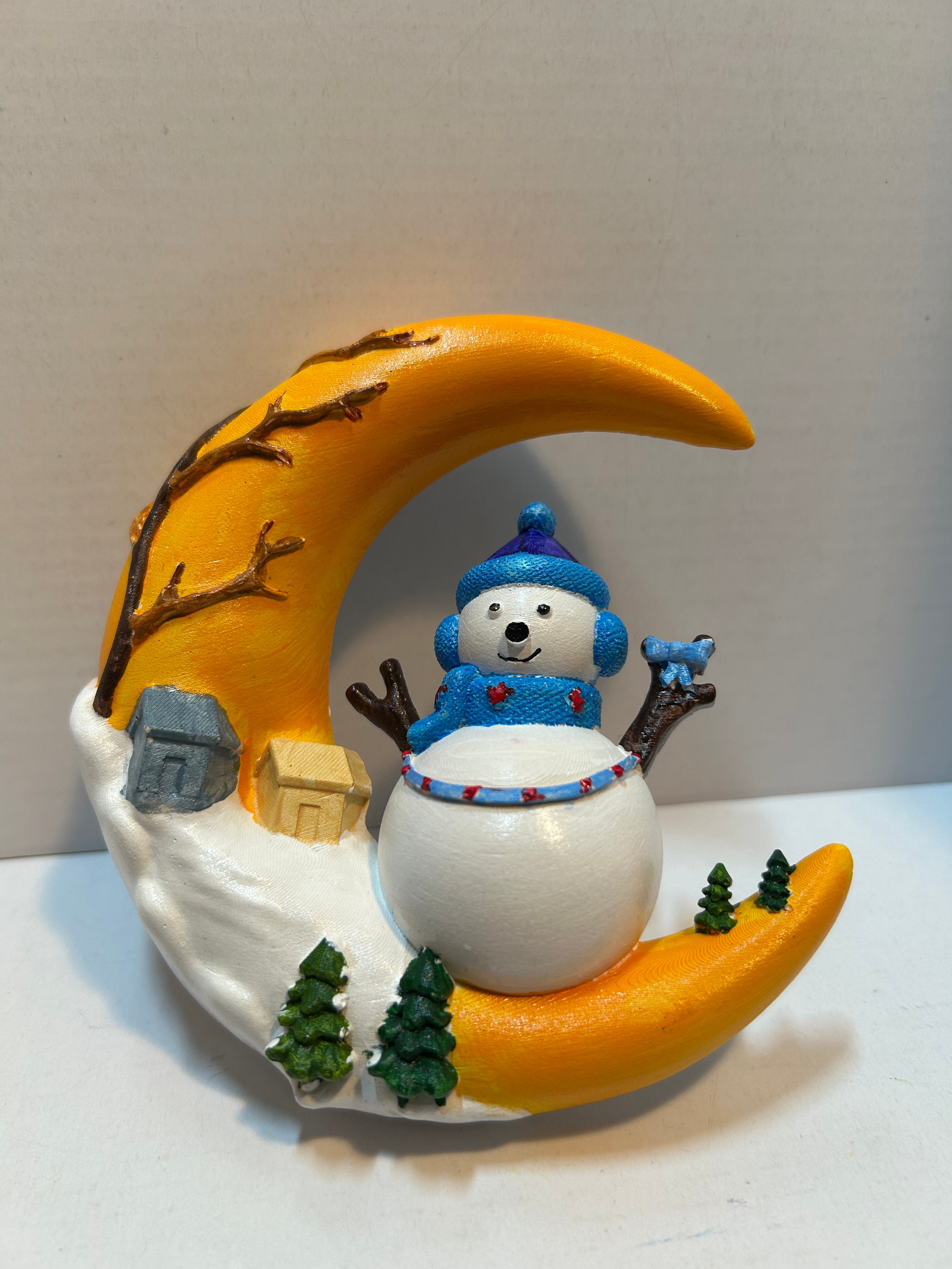 snowman on 1/2 moon