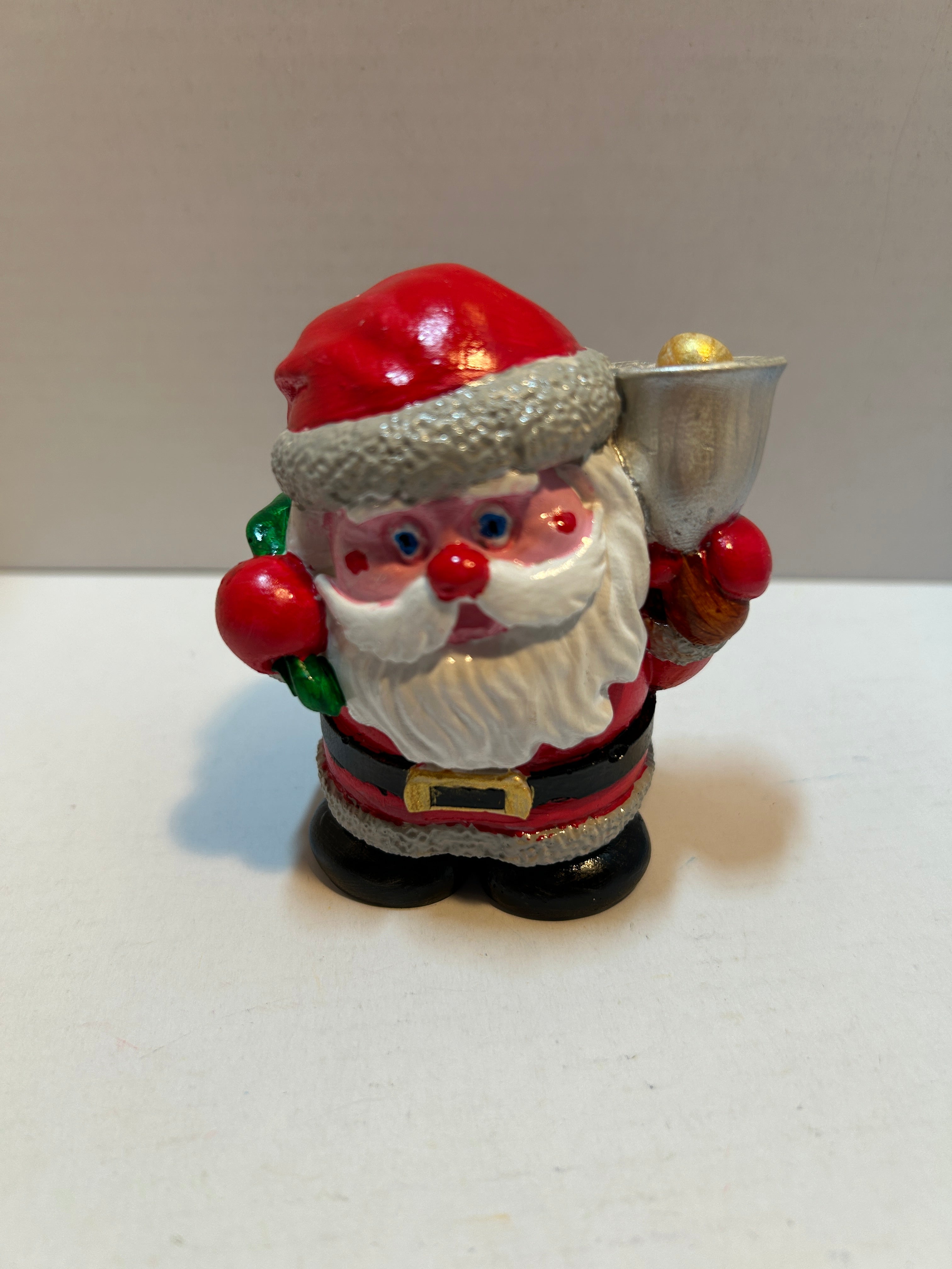 Santa figurine with bell