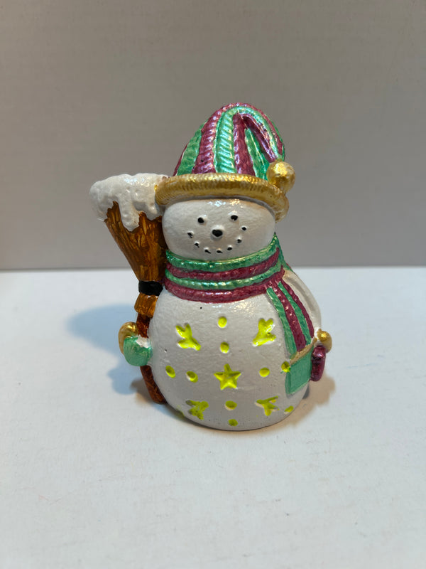 snowman figurine with stars