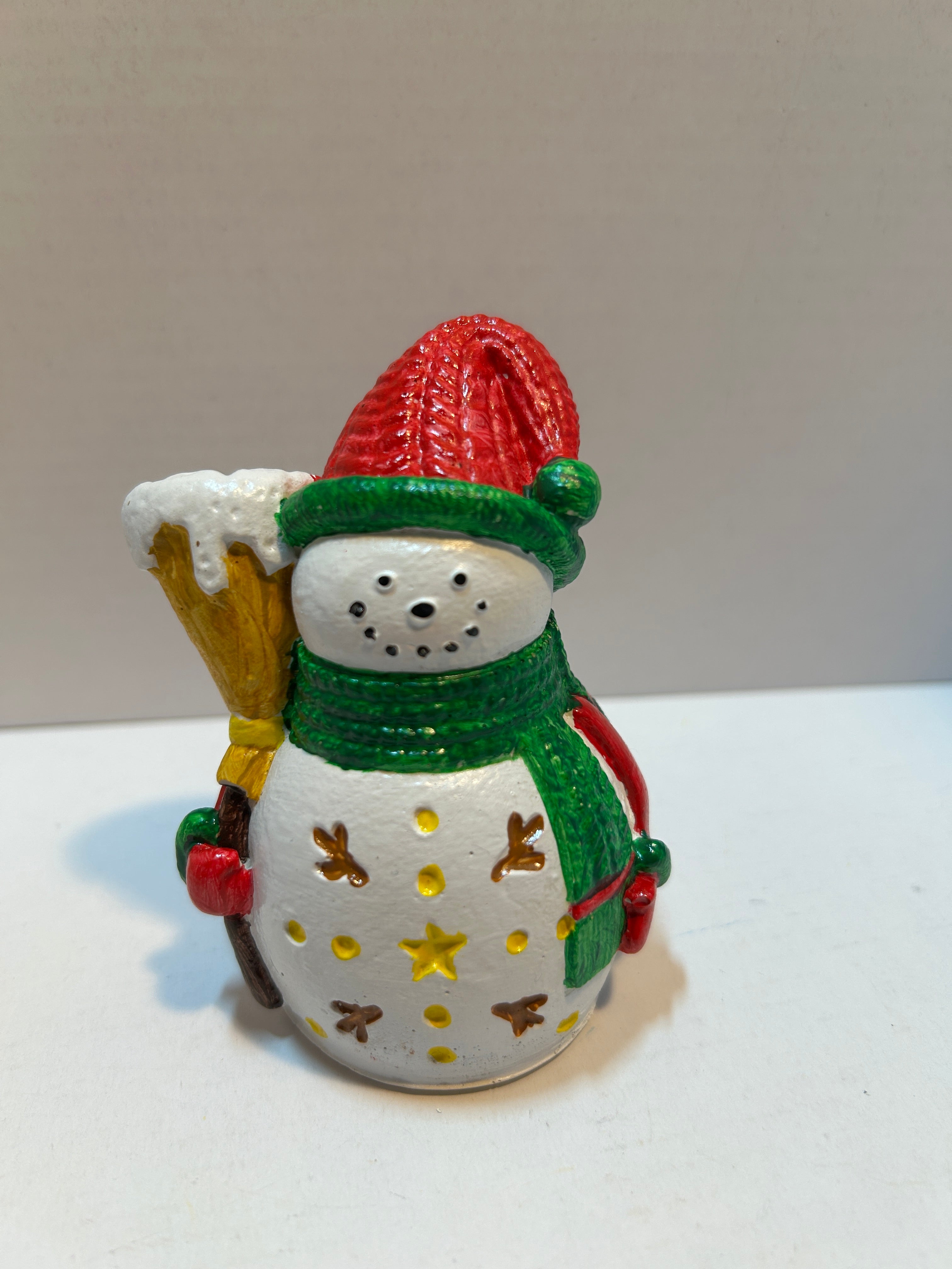 snowman figurine with stars