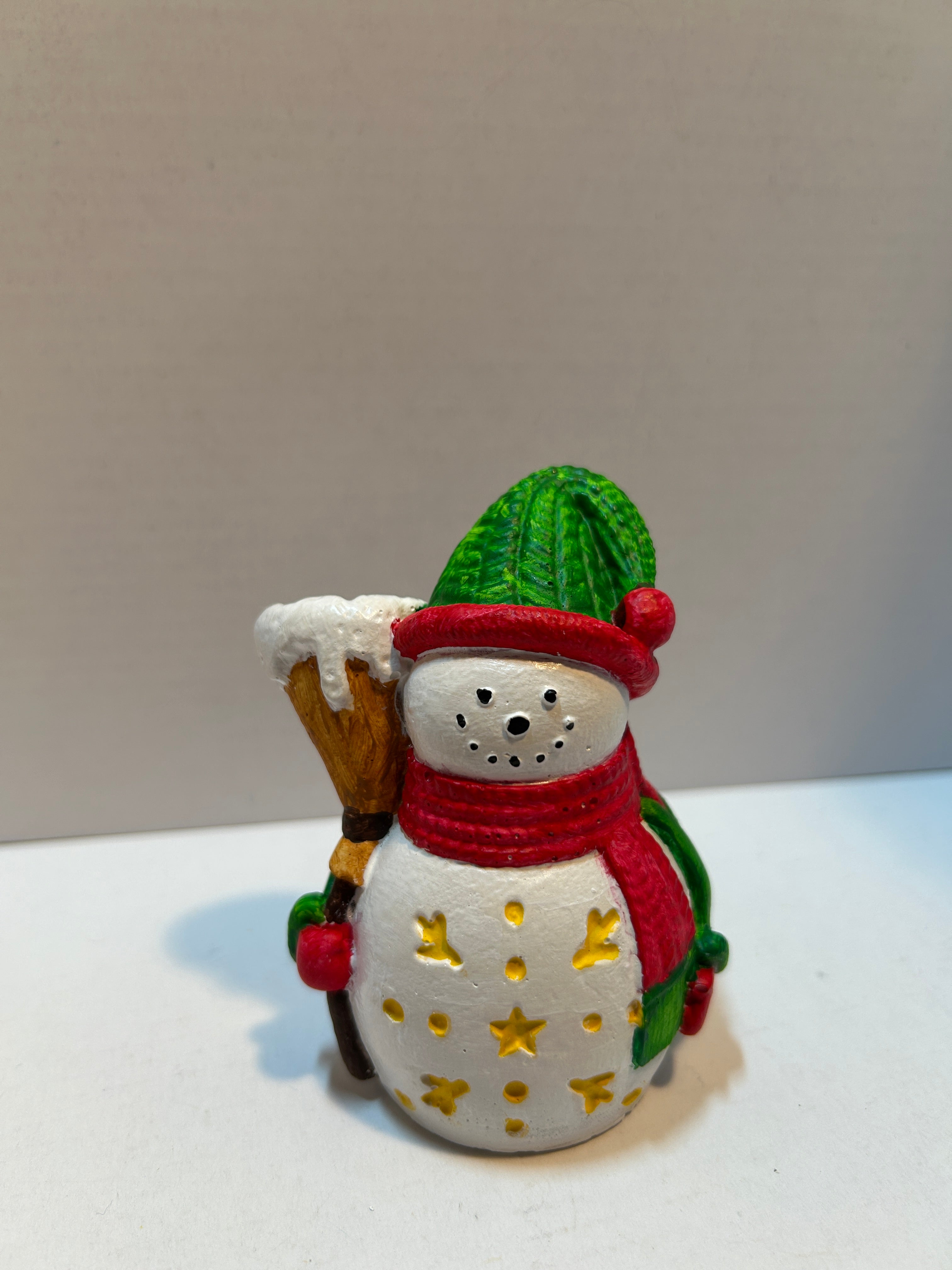snowman figurine with stars