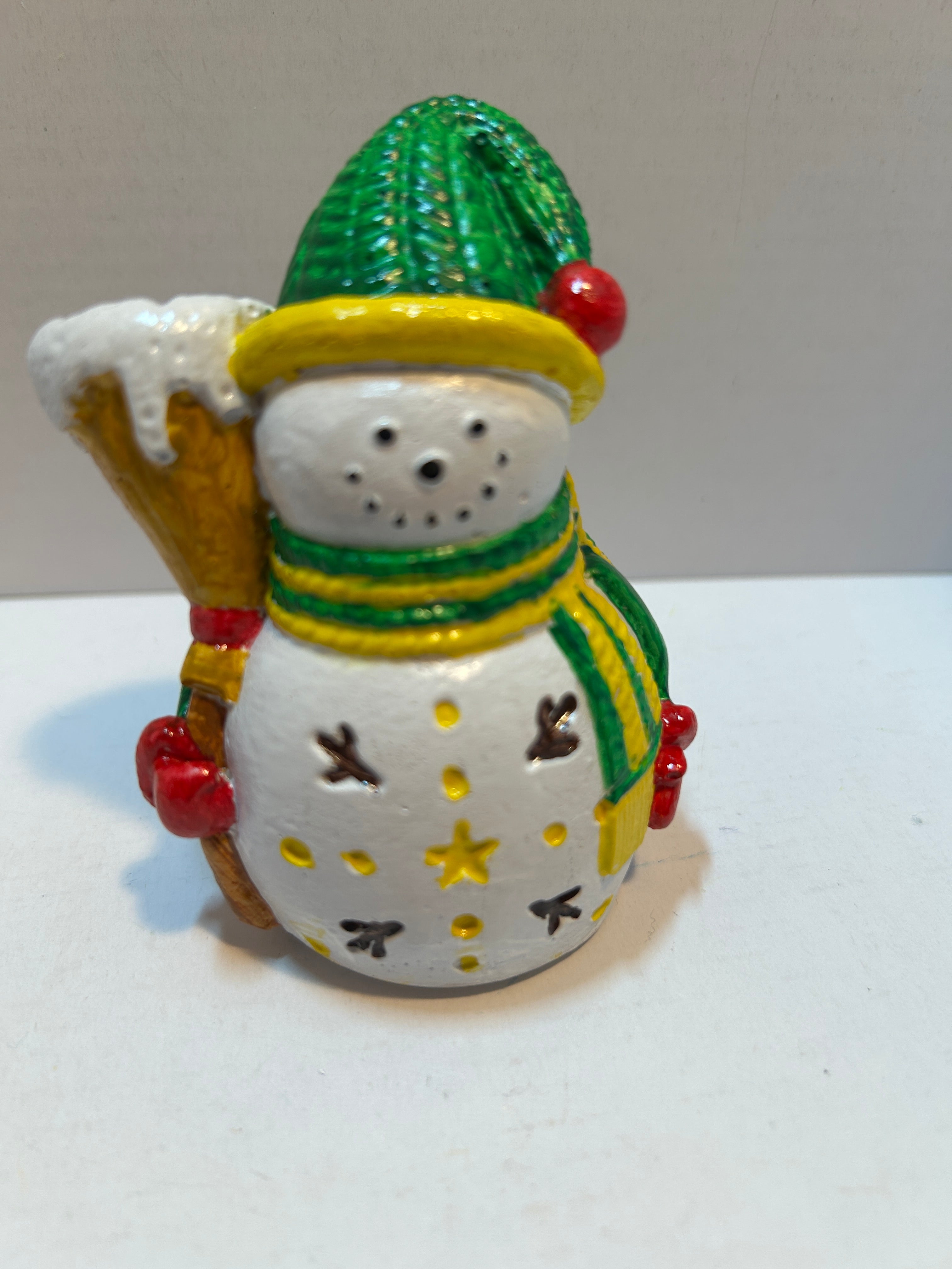 snowman figurine with stars