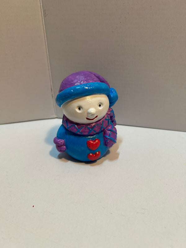 snowman figurine with hearts
