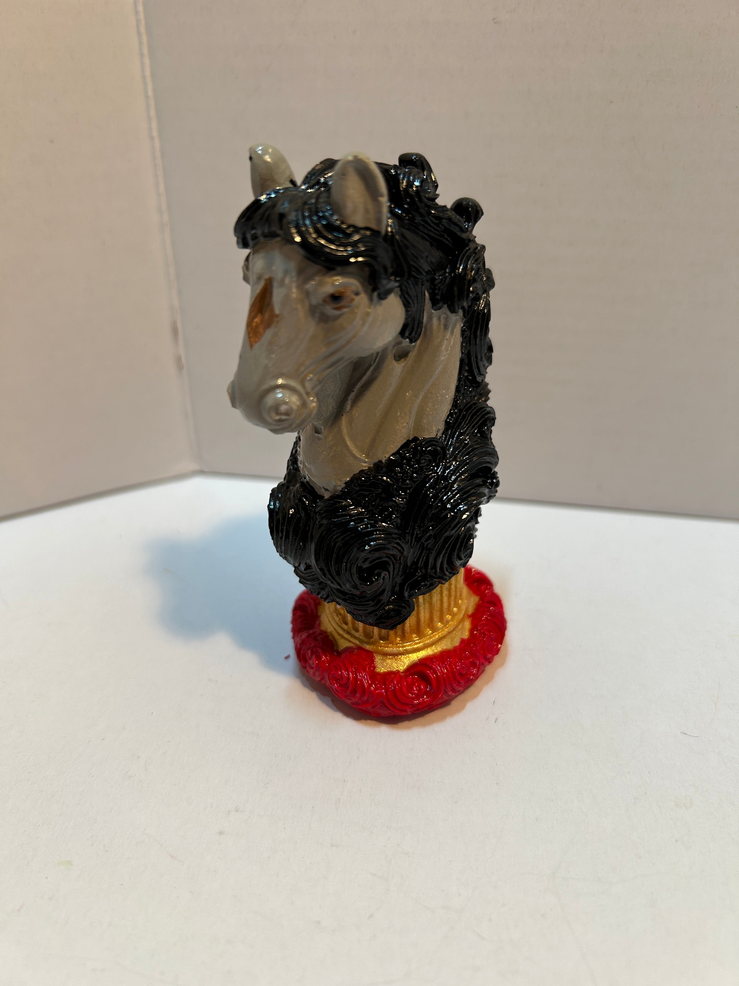 Horse head figurine